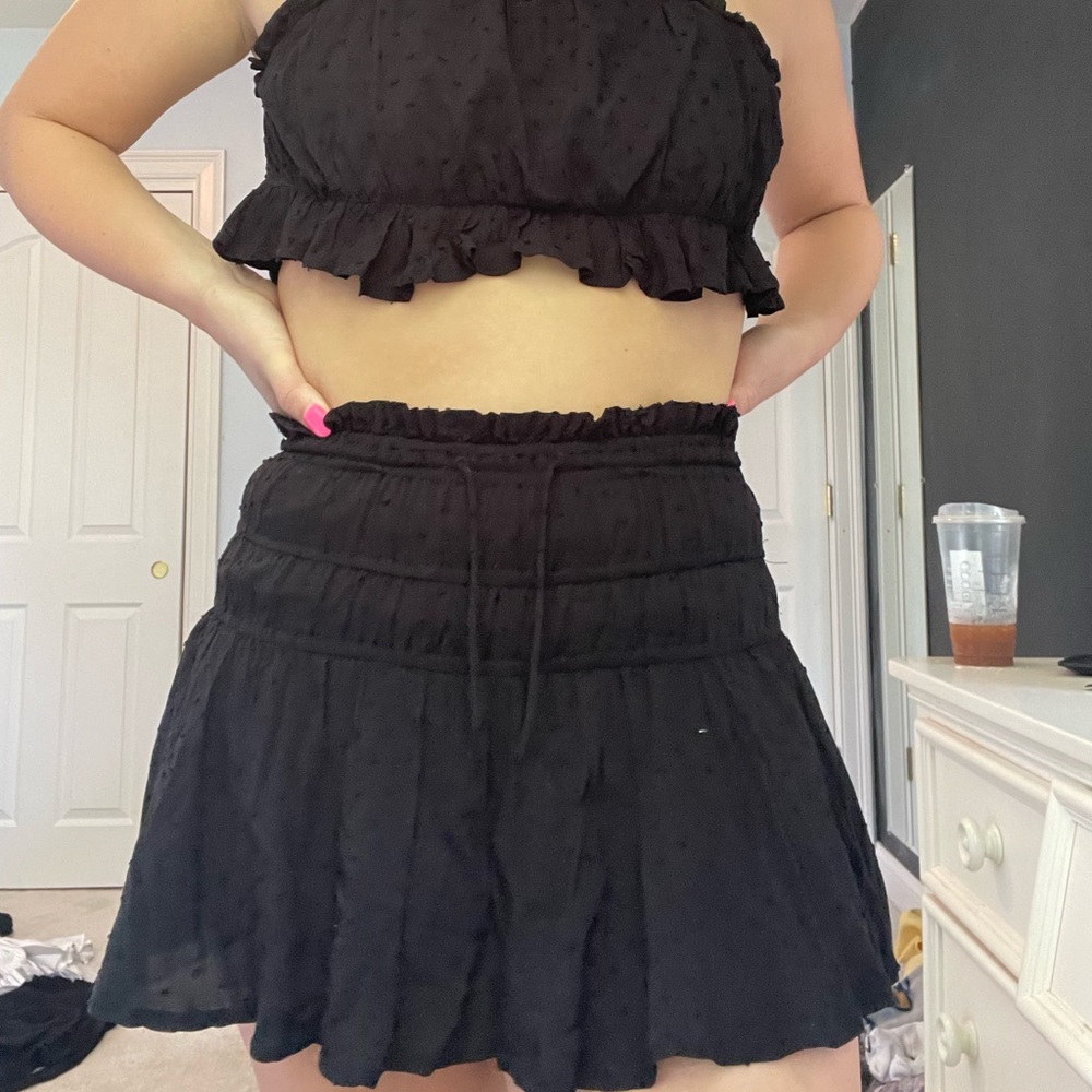 isabelle’s cabinet black shirt and skort set